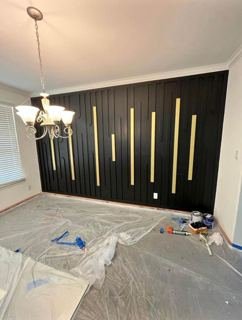 Black and gold accent wall